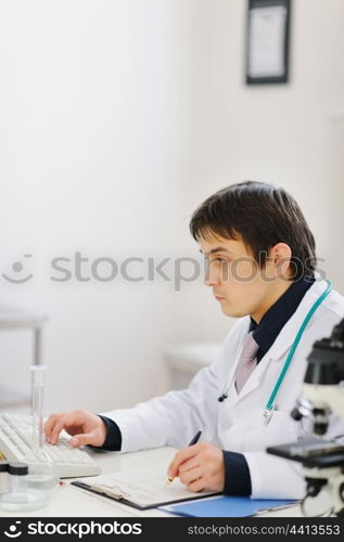 Medical doctor working at laboratory
