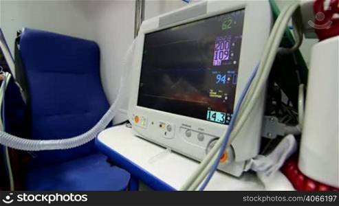 Medical equipment in ambulance screen of patient monitor displayed abnormal high blood pressure with risk of heart attack or stroke