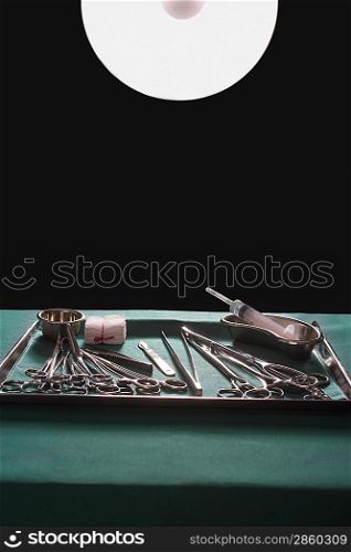 Medical equipment on tray in operating theatre