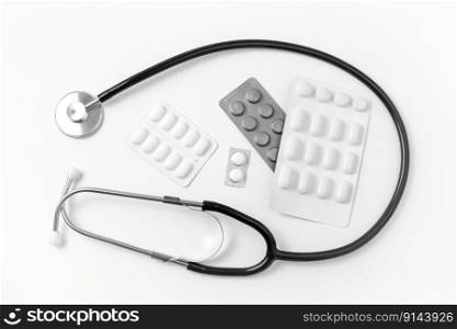 Medical equipment on white background. Stethoscope, pills, tablets. Medical tools. Medicine and healthcare. Medical equipment on white background. Stethoscope, pills, tablets. Medical tools. Medicine and healthcare.