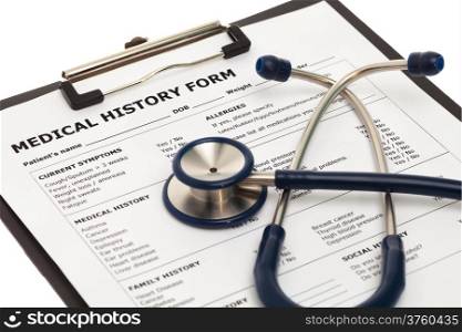 Medical history form on clipboard with stethoscope