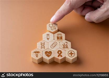 Medical icon on hexagon jigsaw for global health care