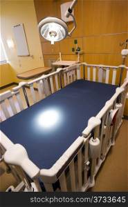 Medical Inspection Light Shines Down Bed Childrens Hospital Room