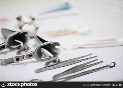 Medical instruments placed on the table.
