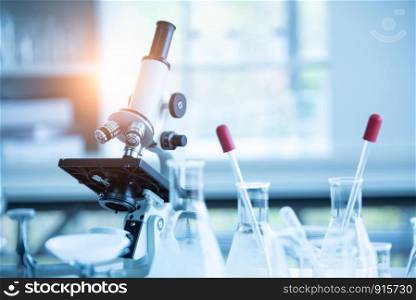Medical laboratory microscope in chemistry biology lab test. Scientific research and development and healthcare concept background