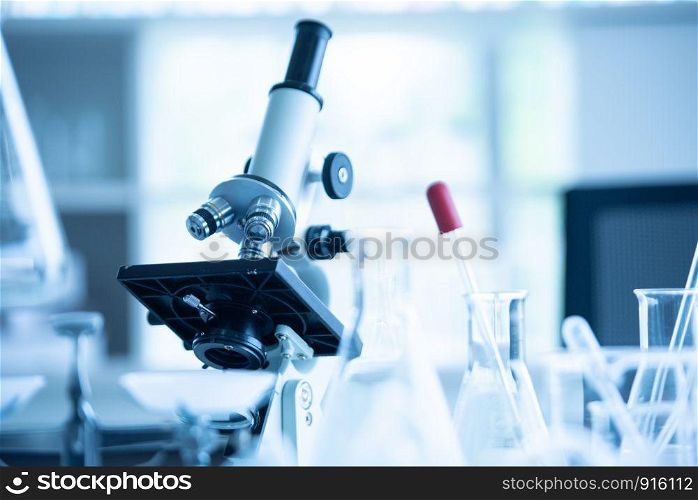 Medical laboratory microscope in chemistry biology lab test. Scientific research and development and healthcare concept background