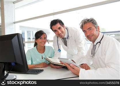 Medical people meeting in hospital office