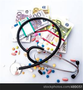 Medical pills,stethoscope in euro money background