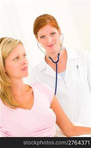 Medical professional female doctor with stethoscope examine woman patient