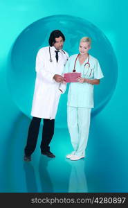 Medical professionals in front of blue background