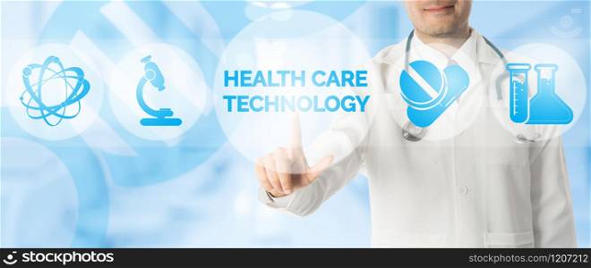 Medical Research Concept - Doctor points at HEALTH CARE TECHNOLOGY with icons showing symbol of technology, hospital research lab and innovation on blue abstract background.