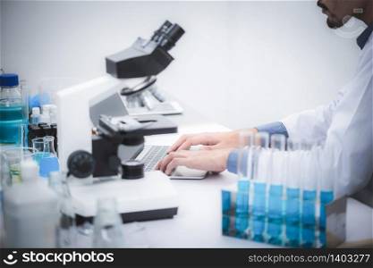 Medical scientists are analyzing data in the laboratory.