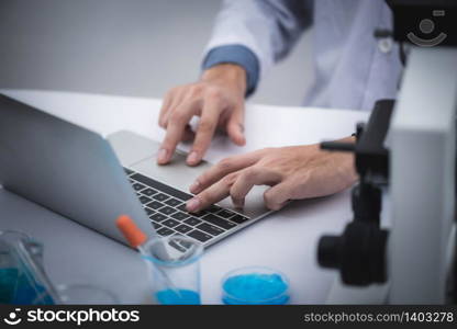 Medical scientists are analyzing data in the laboratory.