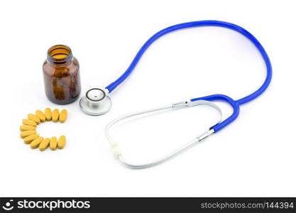 medical stethoscope head with pile of pill closeup. care, health, protection, prevention and help. Healthy life or insurance concept