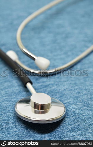 Medical Stethoscope on a blue background closeup
