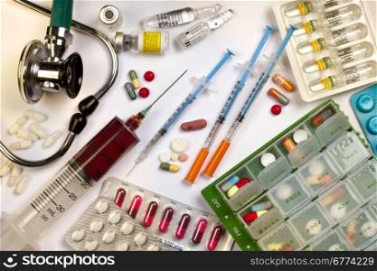 Medical Still Life - Drugs, Syringes, Stethoscope, Ampoules, Injection.