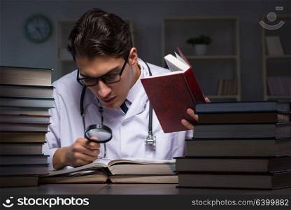 Medical student preparing for university exams at night