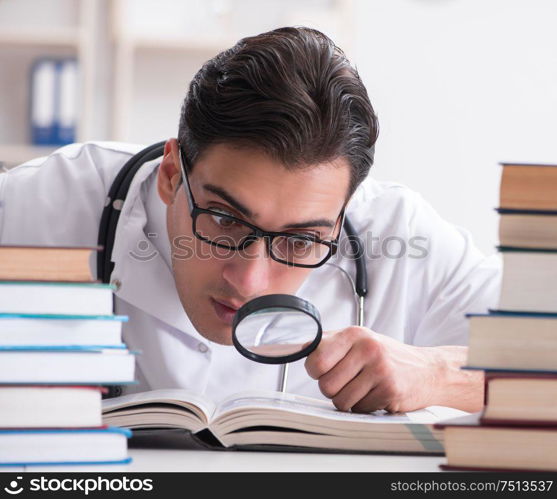 Medical student preparing for university exams. The medical student preparing for university exams