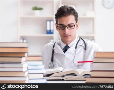 Medical student preparing for university exams. The medical student preparing for university exams