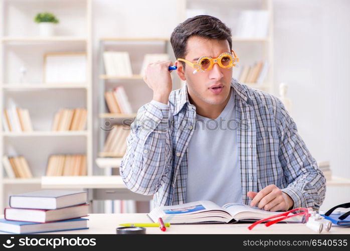 Medical student sitting at the lecture in university