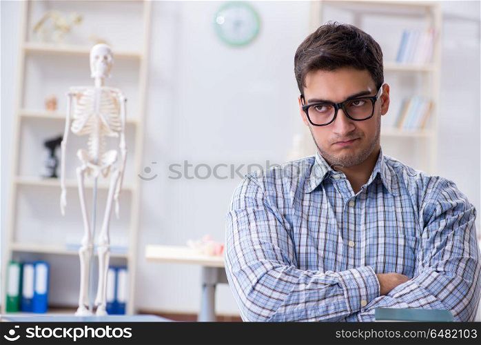 Medical student studying in classroom