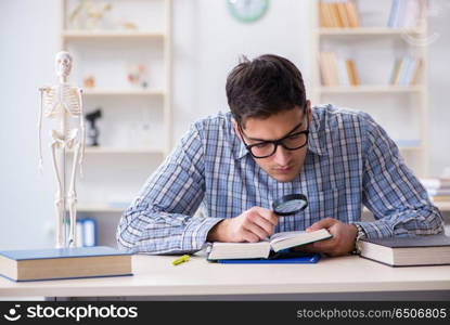 Medical student studying in classroom