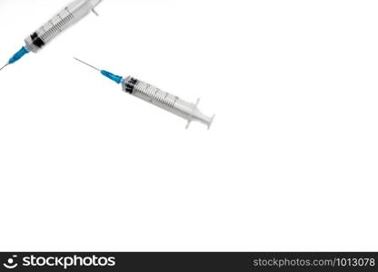 Medical syringe isolated over white background, injection needles for medical use, space for text. Medical syringe isolated over white background, injection needles for medical use,