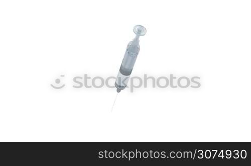 Medical syringe spin on white background