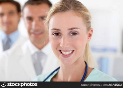 Medical team standing in clinic room