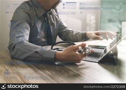 Medical technology concept. Doctor hand working with modern digital tablet dock screen computer with medical chart interface, Sun flare effect photo