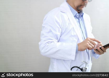 Medical technology concept. Doctor hand working with modern smart phone with medical chart interface,multi channel connection,white background