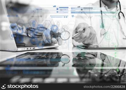 Medical technology network team meeting concept. Doctor hand working with smart phone modern digital tablet and laptop computer with graphics  chart interface, black white