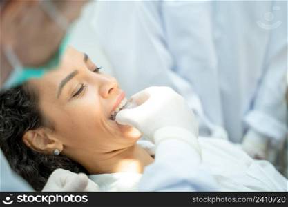 Medical treatment at the dentist office,Dentist examining a patient?s teeth,Teeth health concept.