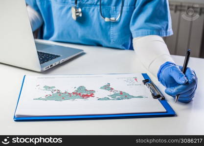 Medical worker analyzing COVID-19 world map,Coronavirus global pandemic outbreak crisis,stats showing worldwide number of infected patients,death toll and mortality rate,possible infection second wave