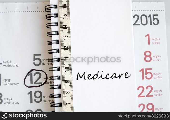 Medicare text concept over tape measure and calendar background&#xA;&#xA;