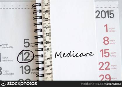 Medicare text concept over tape measure and calendar background&#xA;&#xA;