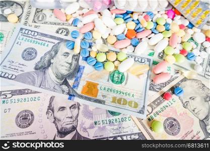 medication concept. Medicine pills with money dollar. Cost of the healthy life