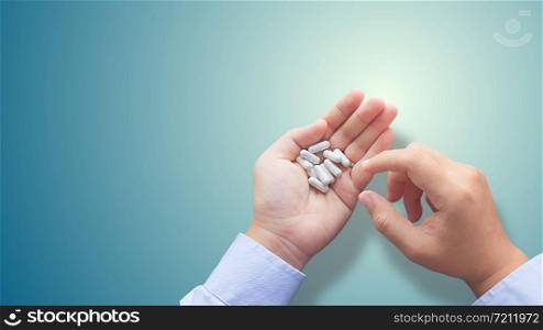Medication on the hands of the sick employee blank background.