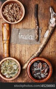 Medicinal plants,herbs in the bowl and elecampane root