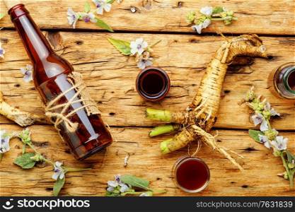 Medicinal tincture of althaea root.Herbal medicine,medicinal herbs and roots.. Althaea root in herbal medicine