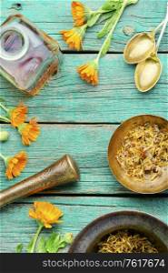 Medicinal tincture of calendula flowers healing herbs in alternative medicine. Calendula healing herbs