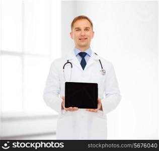 medicine, advertisement and teamwork concept - smiling male doctor with stethoscope showing tablet pc computer screen over blue background