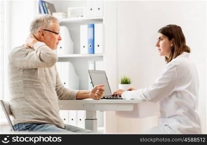 medicine, age, health care and people concept - senior man having problem with neck and doctor with laptop computer meeting in medical office at hospital