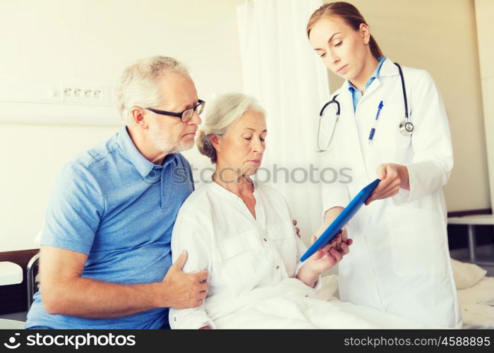 medicine, age, health care and people concept - senior woman, man and doctor with tablet pc computer at hospital ward