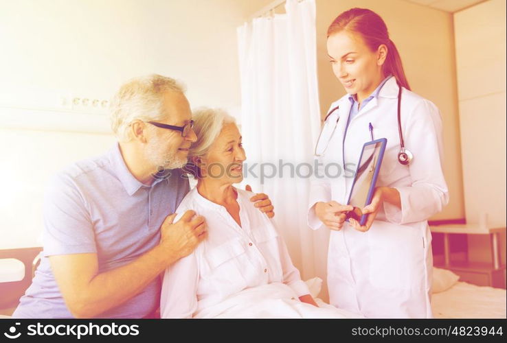 medicine, age, health care and people concept - senior woman, man and doctor with tablet pc computer at hospital ward