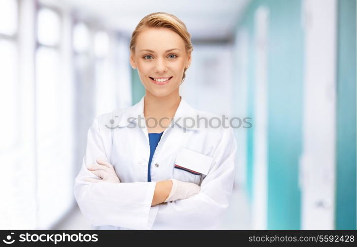 medicine and healthcare concept - attractive female doctor in hospital