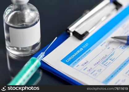 medicine and healthcare concept - close up of clipboard with medical report, pen, syringe and drug on table. medical report, pen, syringe and medicine