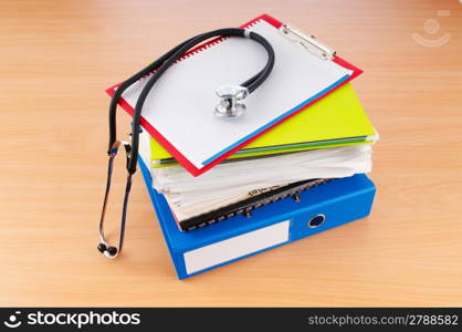 Medicine concept with stethoscope and books