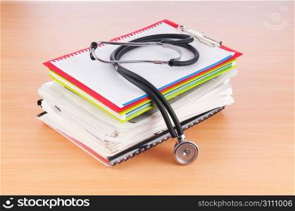 Medicine concept with stethoscope and books