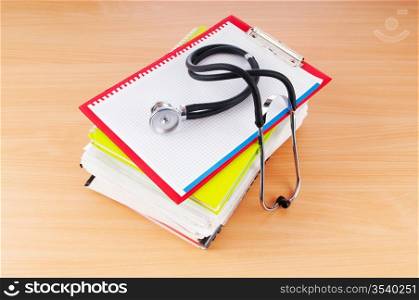 Medicine concept with stethoscope and books